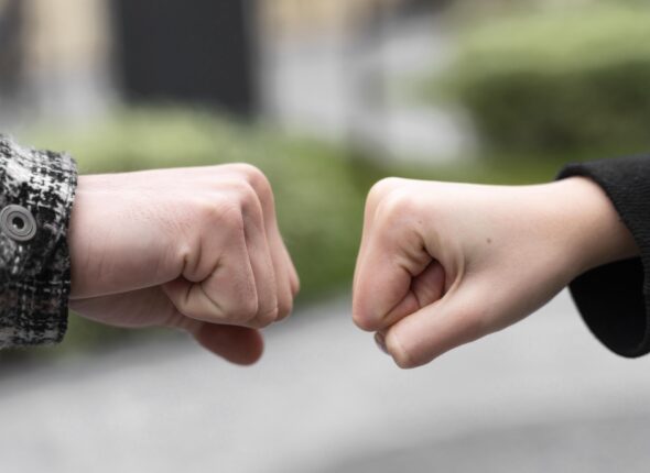alternative-greetings-almost-touching-fist-bumps