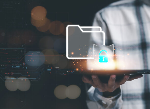 Businessman showing data access protection with key icon, cyber