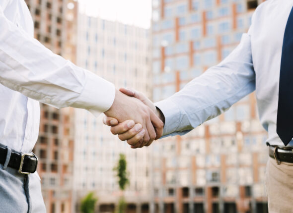 close-up-men-suit-making-agreement