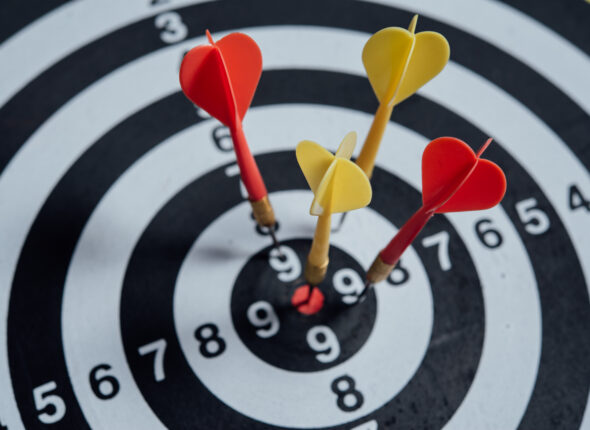 darts arrows in the target center business concept